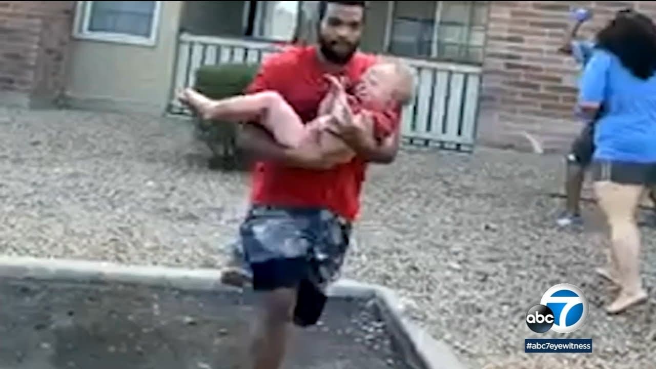Former Marine And Wide Receiver Catches Child From Burning Building