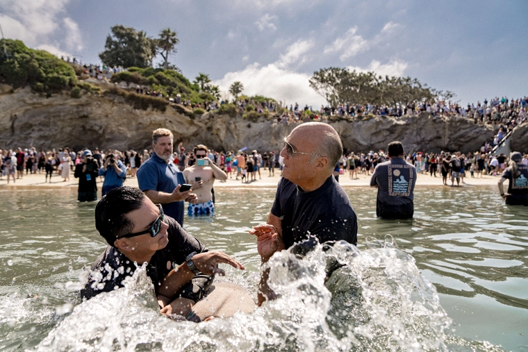 Mass baptism at Pirates Cove